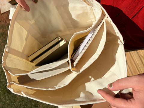 Loblolly Press canvas tote bag with natural fabric and sturdy handles, ideal for carrying books and everyday essentials